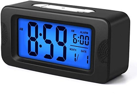 Plumeet Digital Alarm Clock, Light Up All Night, 4'' LCD Display Showing Time Alarm Date, Smart Light Clocks with Snooze for Bedroom Kitchen Office Battery Operated (Black)