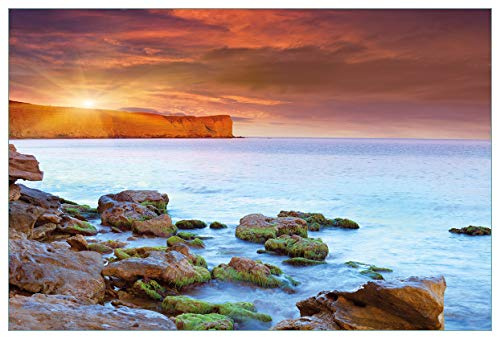 Wallario Küchenrückwand selbstklebend 90 x 60 cm, Motiv: Sonnenaufgang am Meer mit Landzunge und Felsen im Wasser | Spritzschutz abwischbar & pflegeleicht