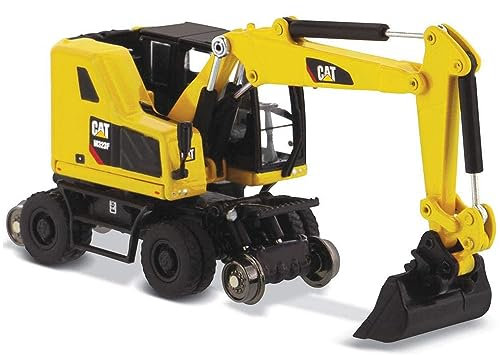Diecast Masters 85612 - Pelle mobile Caterpillar M323F + accessoires, en boîte métallique, échelle 1:87, env. 9,5 x 3,4 x 4,6 cm, 14+, pour modélisme ferroviaire et collectionneurs