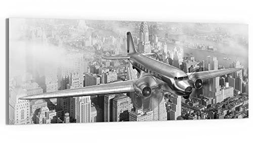 DEQORI Glasbild Echtglas | Motiv Flugzeug über Stadt | horizontal einteilig 125x50 cm | schöne Dekoration | Wandbild für Wohnzimmer, Schlafzimmer, Flur & Küche | moderne Wanddeko