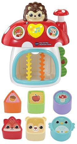 VTech Baby Pop and Play Mushroom House, English | Interactive blocks teach shapes, animals and colours through peek-a-boo play while building motor skills. Ages 9-36 months