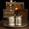 Jinfa 2er-Set Laternen Stimmunglichter mit batteriebetrieber LED-Lichterkette orientalische Zierde Tischdeko Geschenk | Glockenform | Edles Silber | Ø 11 cm × H 19 cm