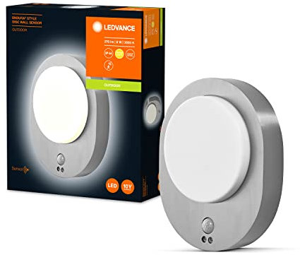 LEDVANCE ENDURA STYLE DISC SENSOR ST 24cm - moderne Außenleuchte mit Bewegungsmelder und Tageslichtsensor, Edelstahl-Gehäuse, ovale LED Wandleuchte, 8 W, 3000 K warmweiß, 485 Lumen