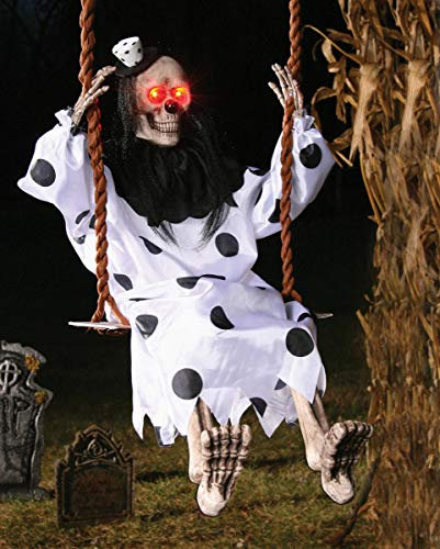 Horror-Shop Clown-Skelett mit roten LED Augen auf Schaukel