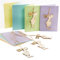 Logbuch-Verlag 5 Osterkarten rosa lila grün gelb blau + Osterhasen Anhänger aus Holz - Ostergrußkarte mit kleinem Ostergeschenk