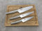Taller Palatina Juego de cuchillos Kai Seki Magoroku Shoso | 1 Santoku + 2 x cuchillo multiusos + tablero de roble 30x22 cm precio de venta al público: 199, - €
