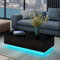 UNDRANDED Moderner Couchtisch Hochglanz mit 4 Schubladen Sofatisch Beistelltisch für Wohnzimmer 95 x 60 x 31cm (Schwarz mit LED Streifen)