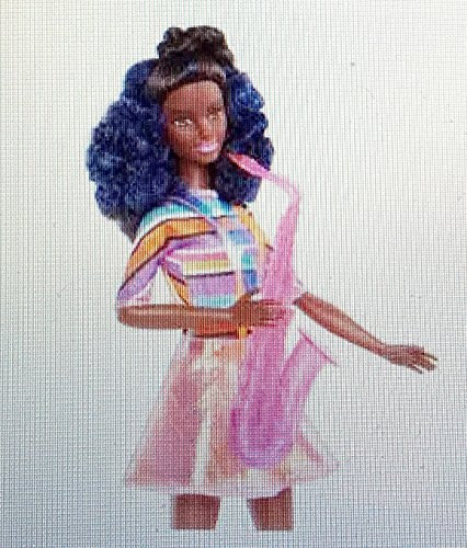 You Can Be Anything Barbie and the Rockers Doll measures approximately 12 inches tall with Hot Pink Saxophone and Coordinating Microphone and Stand
