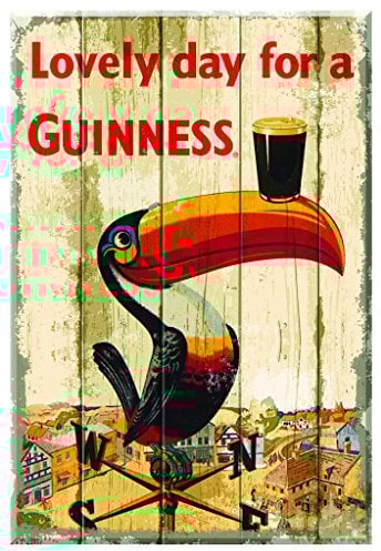 Panneau en bois nostalgique Guinness avec le design du toucan sur la girouette