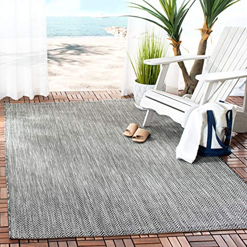SAFAVIEH Outdoor Area Rug 5'3x7'7 - Courtyard Collection - Coastal Design, Black & Beige, Durable & Easy Cleaning, Ideal for Patio, Entryway, Mudroom, Backyard (CY8022-36621)