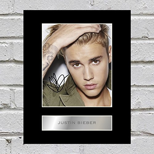 Bild mit Foto und Unterschrift von Justin Bieber