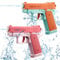 Pistolet a Eau 2 Pièces Pistolets à Eau pour Enfant Water Gun pour Pool Party, Plage, Combat de l'eau, Cadeaux (Orange+Rose)