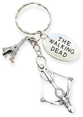 STRASS & PAILLETTES Portes clés Daryl Dixon inspiré de The Walking Dead la Nouvelle Serie en France. Arbalète et médaille TWD Yin and Yang Keychain with Animal Paw