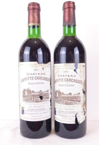 lot de 2 bouteilles saint-estèphe château laffitte-carcasset cru bourgeois (étiquettes abîmées) rouge 1985 - bordeaux