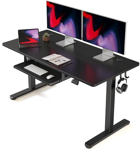 FEZIBO Height Adjustable Electric Standing Desk with Keyboard Tray, 140 x 60 cm Sit Stand up Desk with Splice Board, Black Frame/Black Top