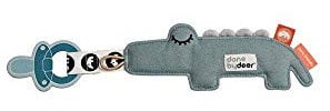 Done by Deer Schnullerhalter Croco - Schnullerband mit Klettverschluss und eine elastische Schlaufe für den Schnuller, Stoff Kuscheltier: 100% Baumwolle. Füllung: Polyesterfasern (recycelt)