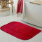 Teppich-Traum Waschbarer Designer Badezimmerteppich – abgerundete Ecken – rot, 60x100 cm