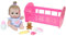 JC TOYS Lil' Cutesies Puppe aus weichem Vinyl, 24 cm, gekleidet mit einem blau melierten Overall, inklusive Kinderbett und 5 Zubehörteilen, Rosa, entworfen von Berenguer, ab 2 Jahren, Sortiert: