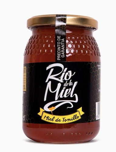 Miele di Timo. Miele puro d'api.ñ, naturale al 100%. Prodotto artigianale di propria raccolta. Aroma floreale intenso. Origine: Spagna.