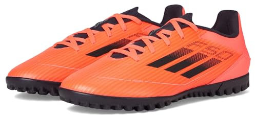 adidas Unisex-Adult F50 Club Turf Sneaker, Turbo/Aurora Black/Platin Metallic, 9.5 Women/8.5 Men
