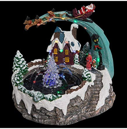 FEERIC LIGHTS & CHRISTMAS Pueblo de Navidad Fuente Papá Noel y Trineo 20 LED + Transformador