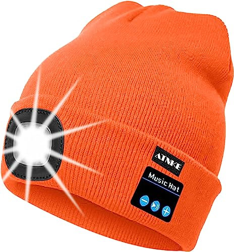 ATNKE LED beleuchtete Bluetooth-Beanie-Kappe, wiederaufladbare USB-Musikalische Laufmütze mit extrem hellem 4-LED-Licht wasserdichte Lampe für das Skifahren Wandern Camping Radfahren (Orange)