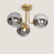 LEDKIA LIGHTING - Deckenleuchte Moonlight Brass | 3 Strahler Metall & Glas | E27 kompatibel | Gleichmäßige Lichtstreuung | Für Wohnzimmer, Schlafzimmer, Küche, Rauchgrau, Glas