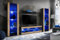 Komodee Wohnwand Wohnzimmerset Tivoli Grande, Wotan/Schwarz, Breite 250cm x Höhe 159cm x Tiefe 35cm, LED Blau, für Wohnzimmer, Schlafzimmer