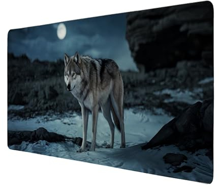 Wolf im Mondlicht Schreibtischunterlage 69x31cm XXL Mauspad - Mystische Tierwelt für Ihr Büro Graues Fell im Schnee Felsiges Gelände und Felsformation Ruhige Atmosphäre erleben