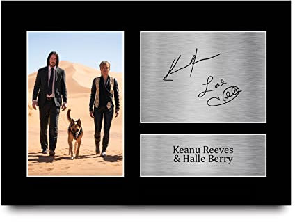 HWC Trading A4 Keanu Reeves & Halle Berry John Wick Geschenke Geducktes Signiertes Autogramm Foto für Fans von Film Memorabilien - A4