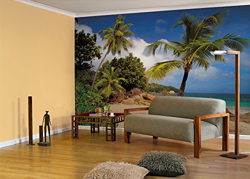 Komar Fototapete PRASLIN | 368 x 254 cm | Tapete, Wand, Dekoration, Wandbelag, Wandbild, Wanddeko, Meer, Palmen, Urlaub, Sonnenschein, Strrand, Sand, Steine | 8-885