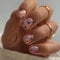Ceboic 24Pcs Short Square Press on Nails Removable Nude False Nails With Flowers Design, Natural Acrylic Full Cover Fake Nails, Reusable Spring Stick on Nail for Women Girls