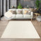 the carpet Cosy kuschelig Warmer Fellteppich, weich und elegant, waschbar und Fußbodenheizung geeignet, Öko-Tex Zertifiziert, Hellbeige, 117 x 160 cm