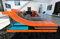 Sofa Dreams Wohnlandschaft Turino U Form Ledersofa - mit LED Beleuchtung, verstellbare Kopfstützen, Recamiere/Lederfarben wählbar/Ausrichtung wählbar (Ottomane Links, Schwarz-Orange)
