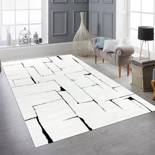 Teppich-Traum Teppich Wohnzimmer Gästezimmerteppich Esszimmer schlicht minimalistisch höheneffekt abstraktes Linienmuster in Creme schwarz, 140 x 200 cm