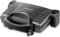 De'Longhi CG298 Raclette Grill con Potencia de 600 W, 4 sartenes con Revestimiento Antiadherente, 4 Madera rasqueta, Acero Inoxidable, 1800 W, 4 kg, Negro