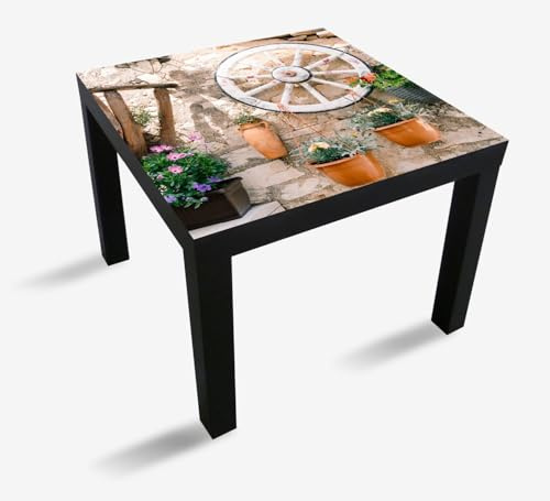Wallario Möbelfolie selbstklebend/Aufkleber, Tischfolie geeignet für IKEA Lack Tisch - Möbeldeko Wagenrad an Natursteinwand in 55 x 55 cm