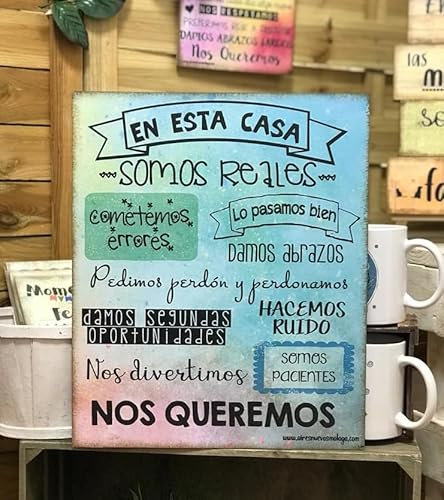 Cuadro de madera hecho a mano, con frases y mensajes positivos e inspiradores para decorar el hogar y regalar En esta casa somos reales.... Original. Personalizados. Diseños propios.