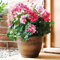 Coopers of Stortford - Artificial Potted Flowers - Pink Geraniums in Weatherproof Pot - Lifelike Outdoor Floral Display - No Watering Needed - 56cm