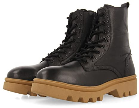 Bottines noires type motard à lacets et clous en argenté avec semelle track en caramel et noir pour femme hachiville