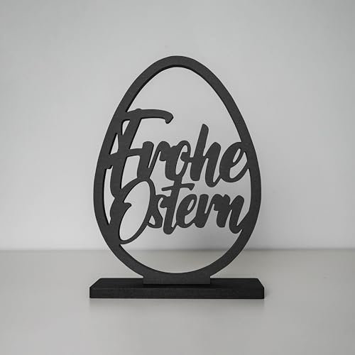 ebenkunst | Frohe Ostern Aufsteller eiförmig | 16.7 x 24 cm | Osterdeko aus schwarzem Holz | Dekorativer Osterei Aufsteller für Tisch, Regal & Fensterbank | Frühlings- & Osterdekoration