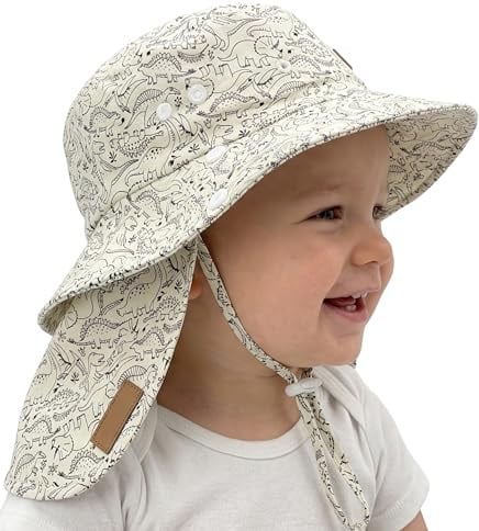 HECKBO Sombrero para niños pequeños con UPF 50+ UV - Dinosaurios - 100% algodón - 6-24 Meses - Sombrero de bebé con protección para el Cuello, Correa de Barbilla Ajustable, Gorro de baño para niños