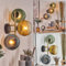 HOFSTEIN Wandleuchte Koyoto, Wandlampe aus Metall/Riffelglas in Schwarz/Gold/Kupfer, moderne Leuchte im Retro/Vintage-Design (Schirme Ø 15 cm), E14, Wohnzimmer, Schlafzimmer, Küche, Flur, Treppenhaus