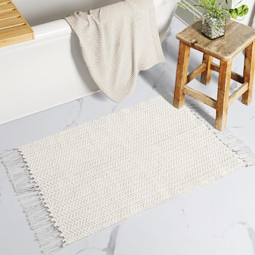 The Seeker Boho Bath Mat, Washable Thin Indoor Door Mat, Soft Absorbent Kitchen Rug, Small White Woven Cotton Rug with Tassels, Low Pile Carpet for Bathroom, Front Door, Bedroom or Laundry