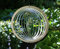 Manufaktur Lichtbogen Edelstahl Windspiel Kreis Kugel 12 cm mit Glaskugel