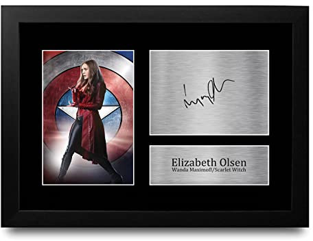 HWC Trading FR A4 Elizabeth Olsen WandaVision Scarlet Witch Geschenke Gedrucktes Signiertes Autogramm Foto für Fans von Fernsehshows - A4 Gerahmt