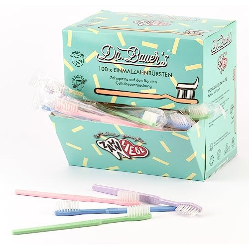 Dr. Bauer's Einmalzahnbürsten mit Zahnpasta 100er Pack, Nachhaltige Einwegzahnbürste Ideal für Reisen, Zahnärzte, Hotels - umweltfreundlich mit Strohanteil in Spenderbox (violett/grün/blau/rot)