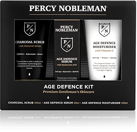 Percy Nobleman Age Defence Kit, a men's skincare set containing Charcoal Face Scrub (with Natural AHAs), ultra-hydrating Facial Serum (with Hyaluronic Acid), and Moisturiser (with Vitamin C)