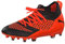 PUMA Unisex Kids Future 2.3 Netfit FG/AG Jr Fußballschuhe, Black-Shocking Orange