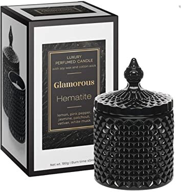 Dekohelden24 Duftkerze Glamorous Hematite im dekorativen schwarzem Glas, Duftrichtung: Lemon, Rosa Pfeffer, Jasmin, Patchouli, Vetiver, weißer Moschus, Größe: H/Ø 14 x 8 cm, 180 gr